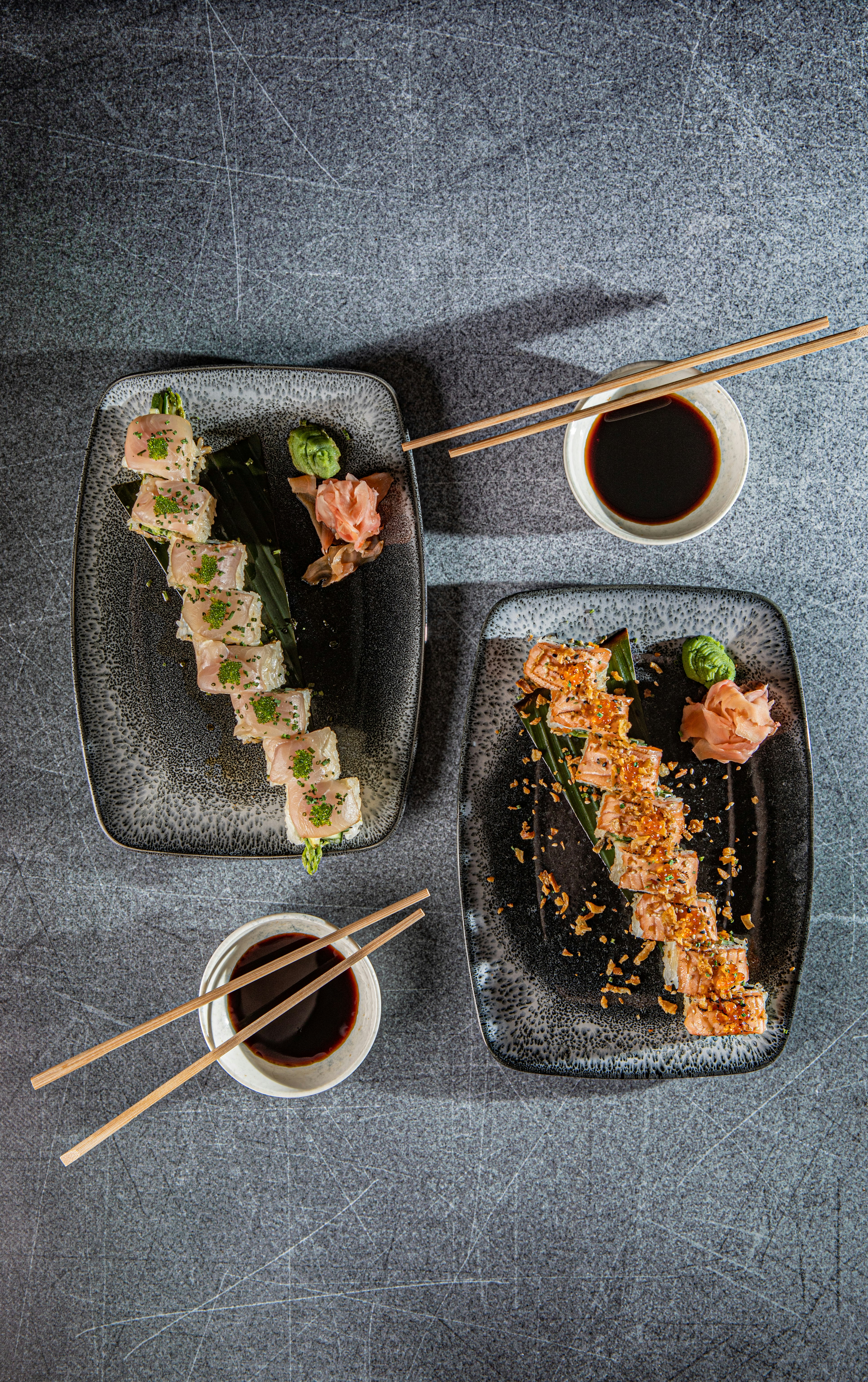 sushi on black rectangular tray